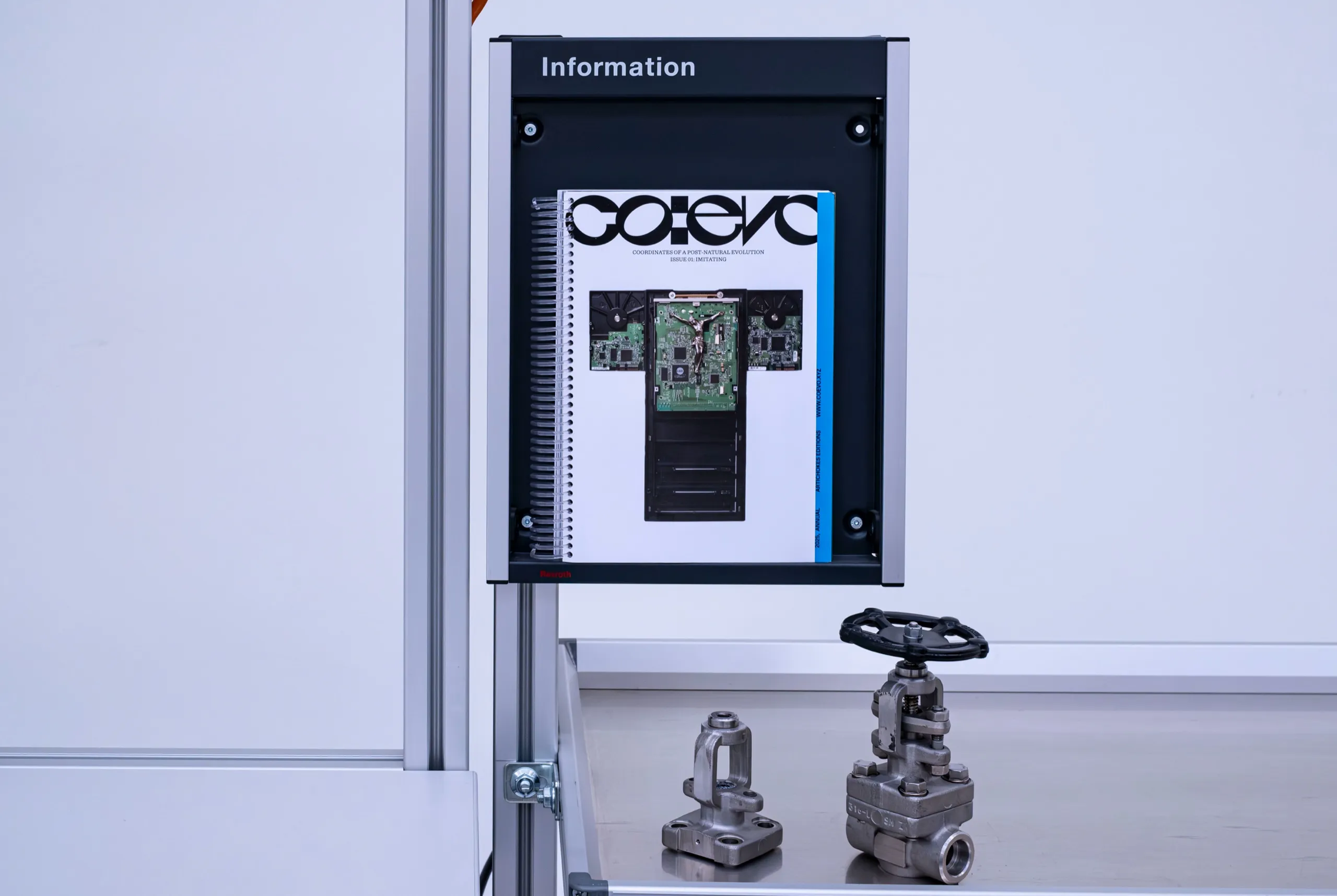 co:evo displayed in an Information panel, above two metal valves